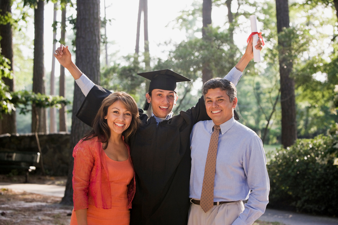 Happy parents with excited graduate